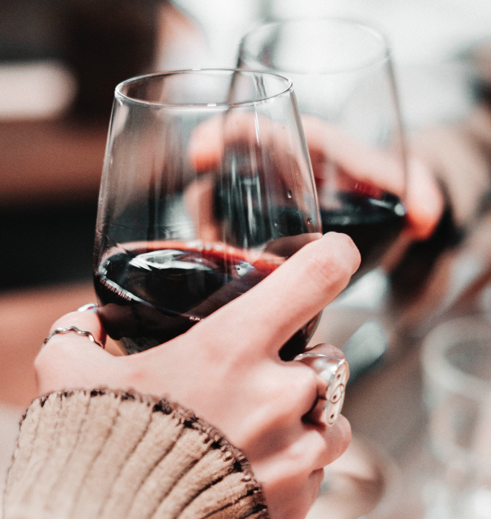 Celebratory toast with red wine. Niche Restaurant event concept