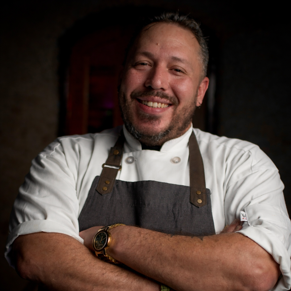 Chef Carlos Morales preparing a private event menu at Niche Restaurant, private dining in San Juan Puerto Rico